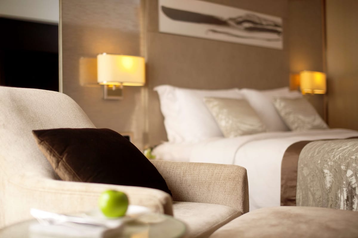 Deluxe Room, City View | In-room safe, desk, laptop workspace, free cots/infant beds