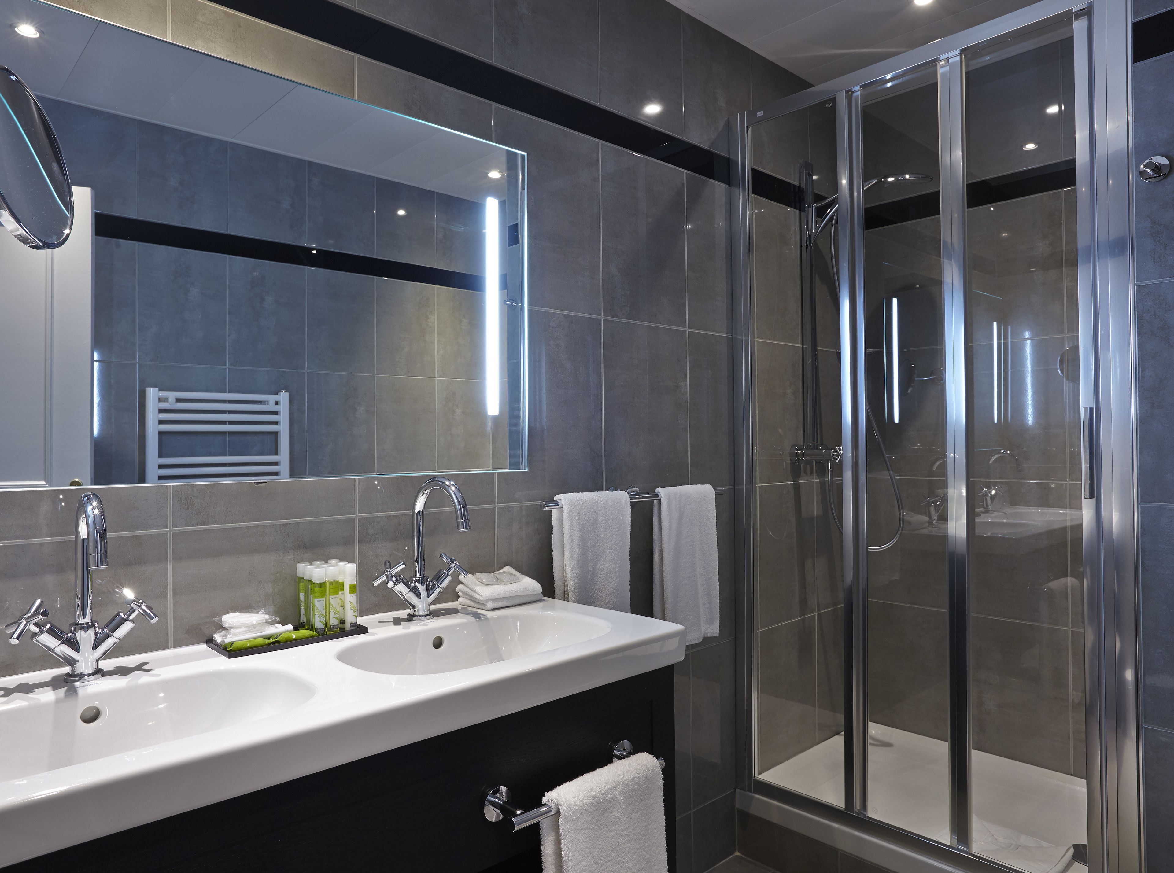 family room | bathroom | designer toiletries, hair dryer, bathrobes, towels