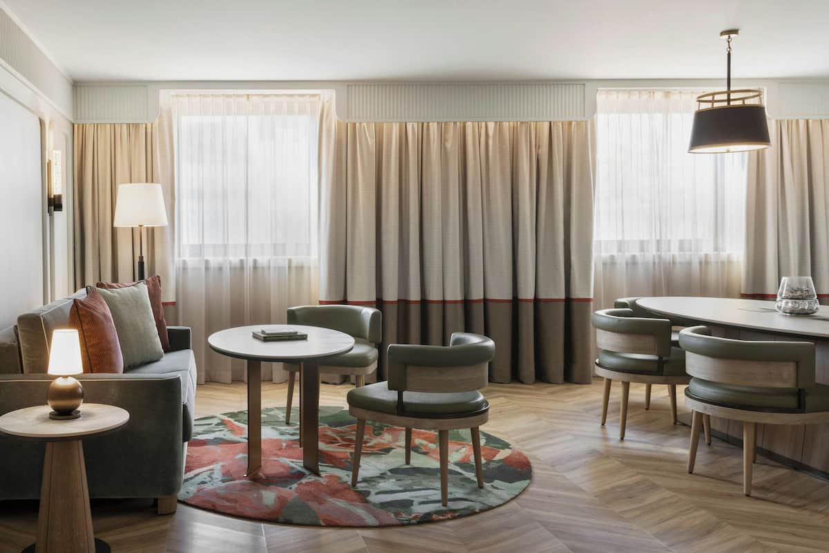 Suite, 1 Bedroom (View) | Living room | 49-inch flat-screen TV with satellite channels, TV, pay movies