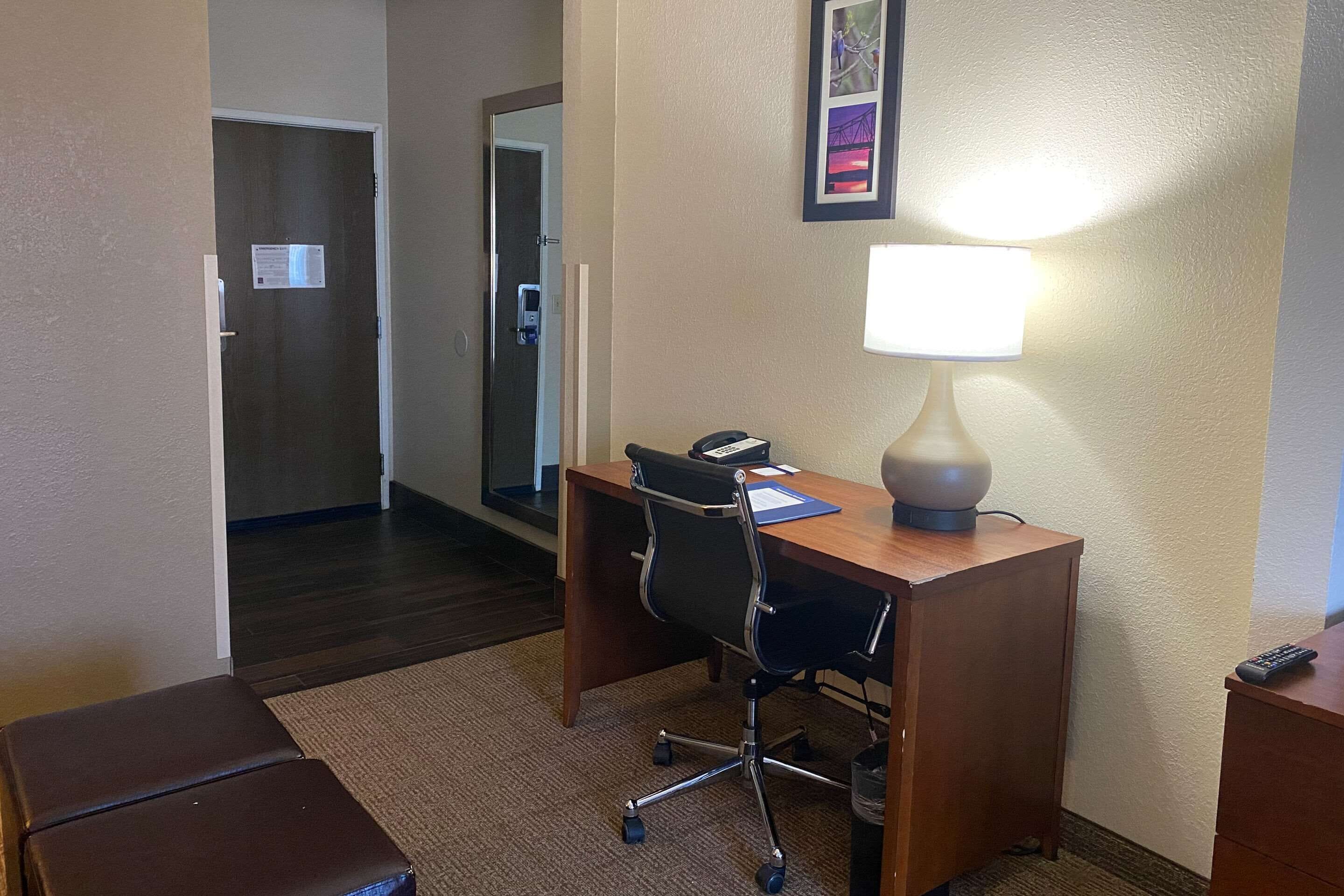 suite, 1 king bed, non smoking | desk, laptop workspace, blackout curtains, iron/ironing board