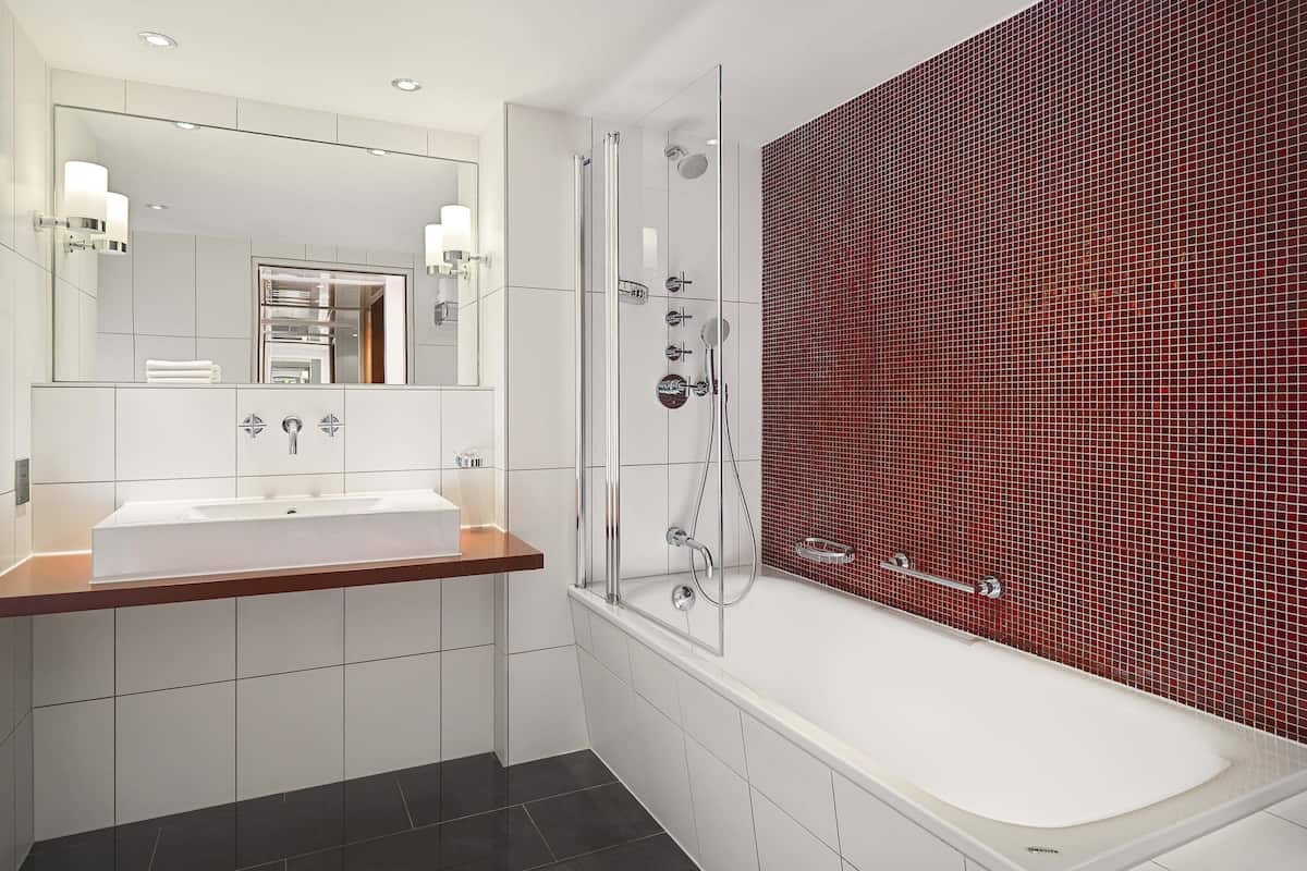 shower, deep-soaking bathtub, free toiletries, hair dryer