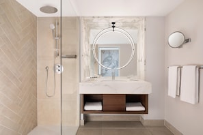 Shower, deep-soaking bathtub, free toiletries, hair dryer