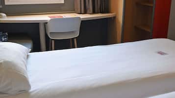 Premium bedding, desk, blackout drapes, soundproofing