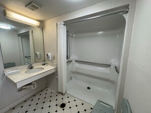 Room, 1 King Bed, Mobility Accessible, Non Smoking (Roll-in Shower) | Bathroom | Combined shower/tub, free toiletries, hair dryer, towels