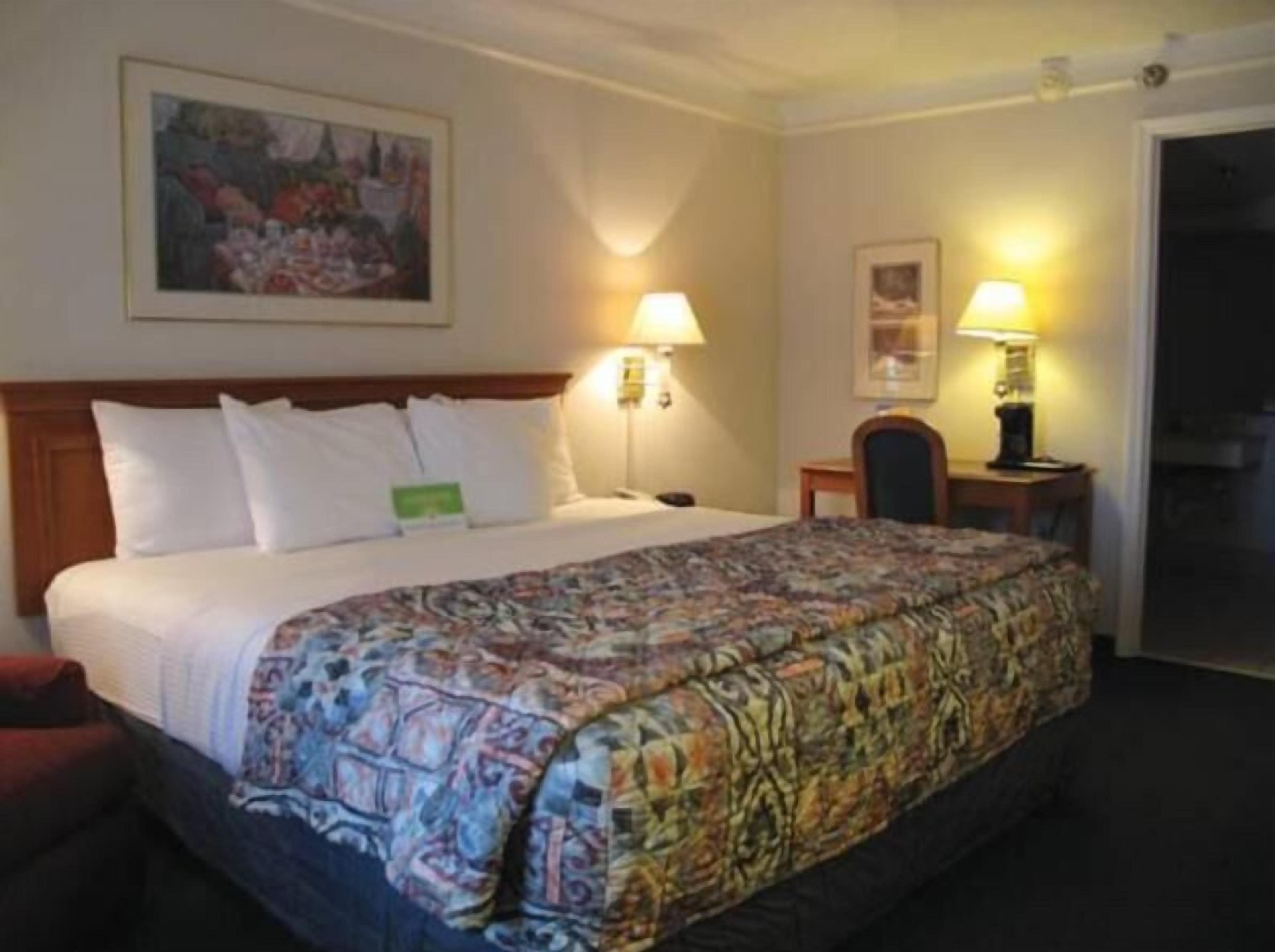 Premium bedding, pillowtop beds, desk, laptop workspace