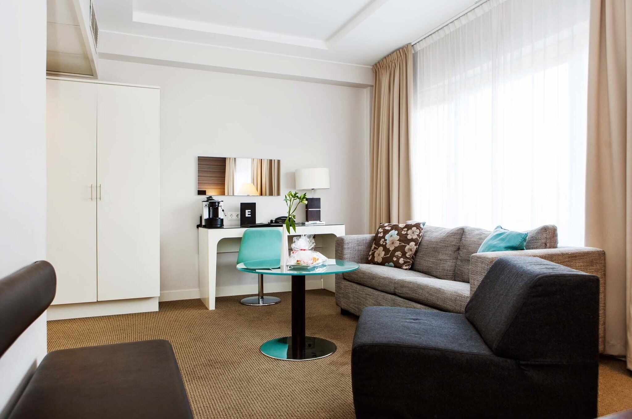 junior suite with view | minibar, in-room safe, desk, blackout curtains