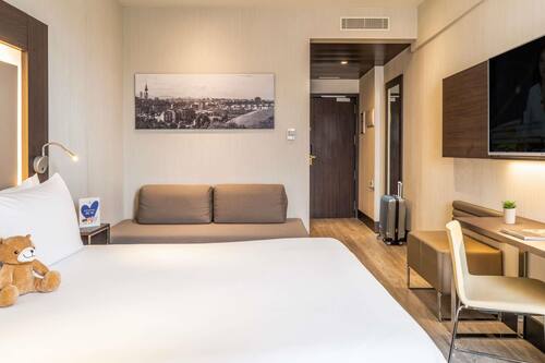 Hypo-allergenic bedding, down duvets, minibar, in-room safe