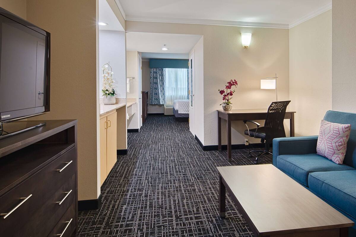 suite, 1 king bed, non smoking, refrigerator & microwave | desk, laptop workspace, iron/ironing board, free wifi