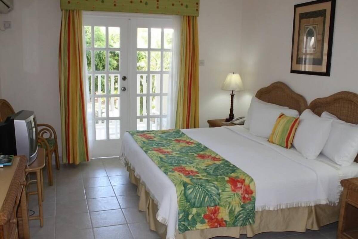 In-room safe, blackout curtains, iron/ironing board, cots/infant beds