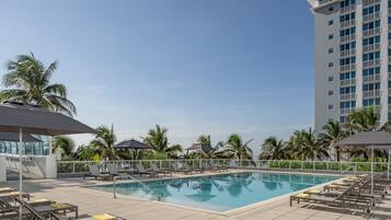 Outdoor pool, pool umbrellas, pool loungers