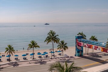 On the beach, sun loungers, beach umbrellas, beach towels