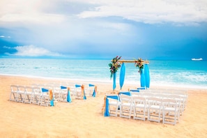 On the beach, sun loungers, beach umbrellas, beach towels