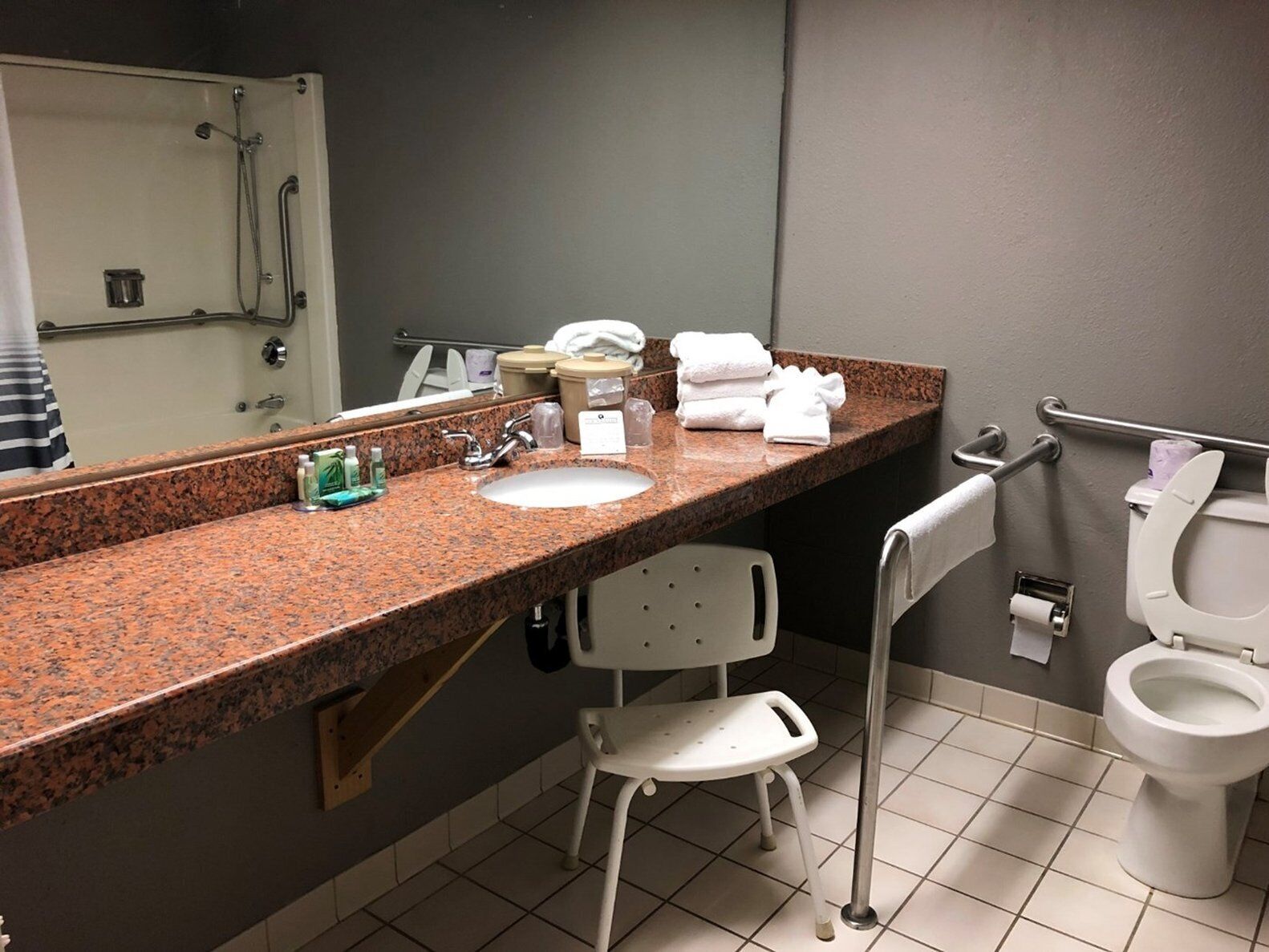 hypo-allergenic bedding, desk, blackout curtains, soundproofing