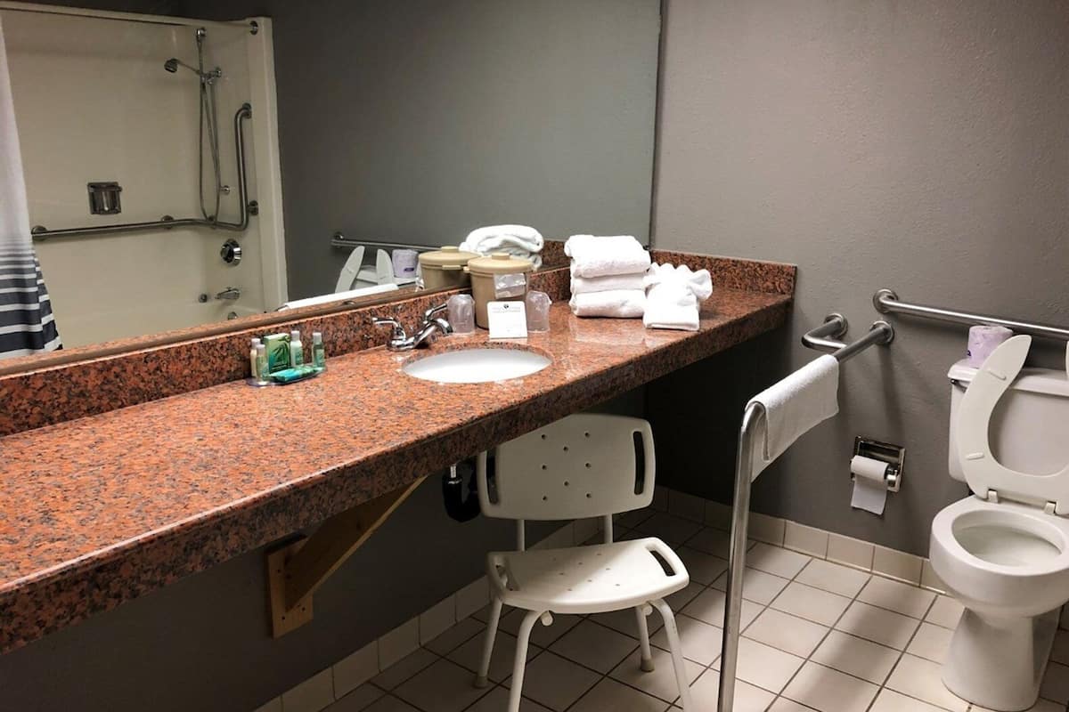 hypo-allergenic bedding, desk, blackout curtains, soundproofing