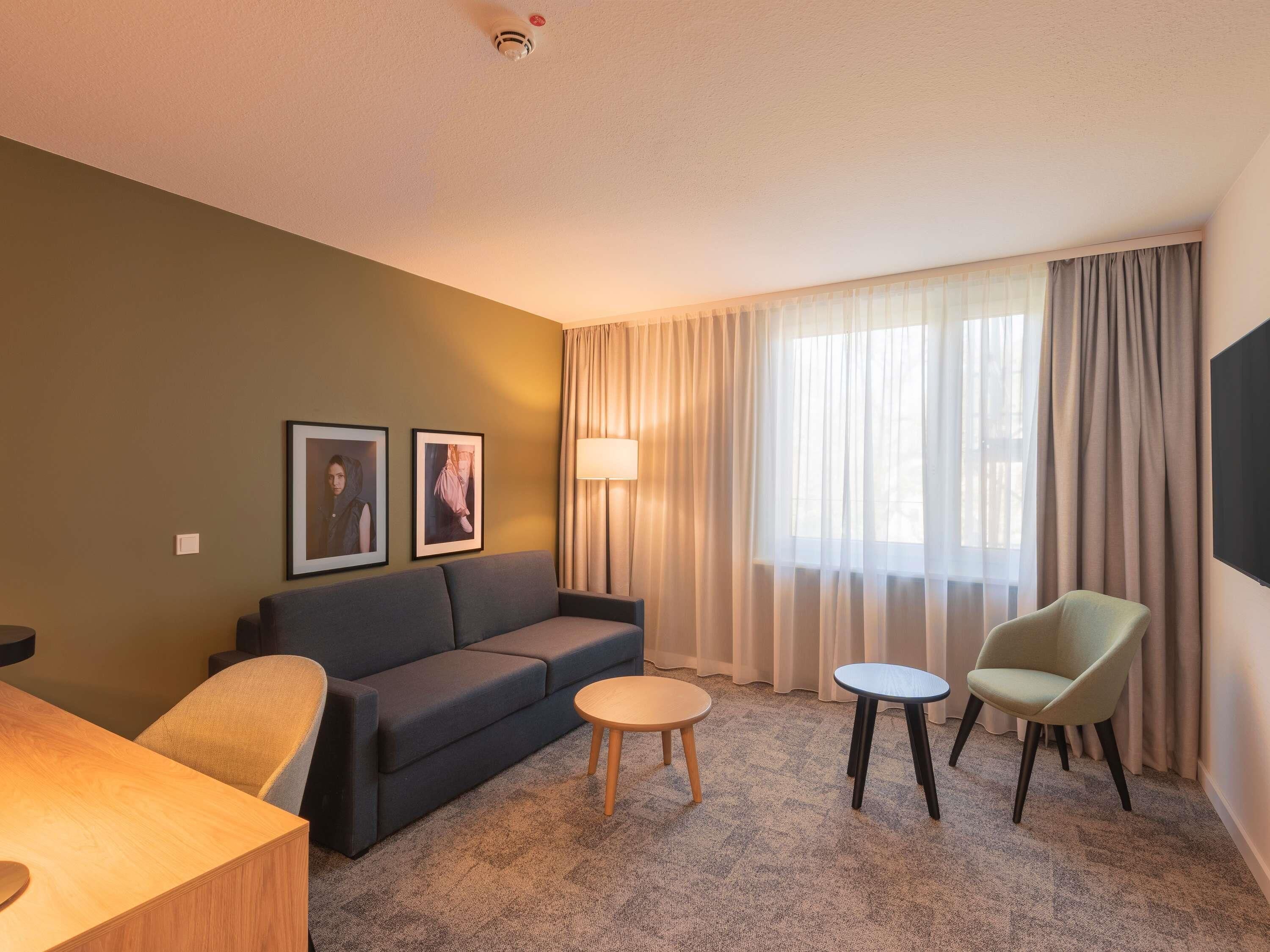 Junior-Suite, 1 King-Bett und Schlafsofa | 1 Schlafzimmer, Allergikerbettwaren, Zimmersafe, Schreibtisch