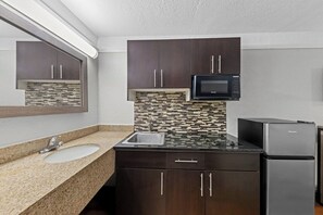 Desk, blackout curtains, iron/ironing board, free cots/infant beds