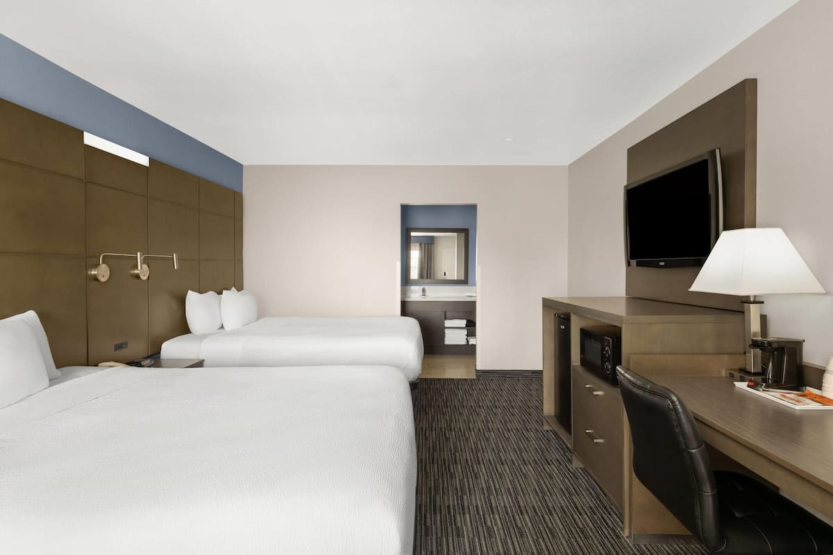 Room, Multiple Beds | Desk, blackout curtains, iron/ironing board, free cots/infant beds