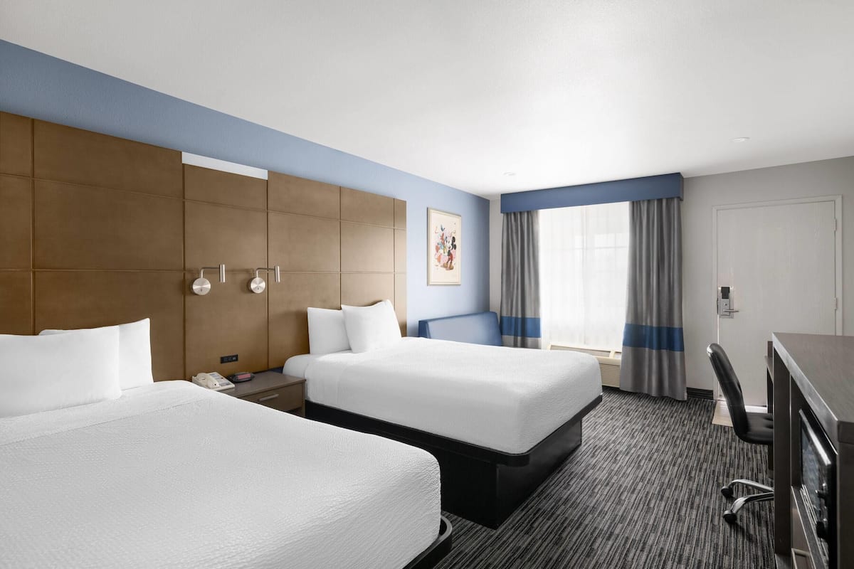 Room, 2 Queen Beds, Non Smoking | Desk, blackout curtains, iron/ironing board, free cots/infant beds