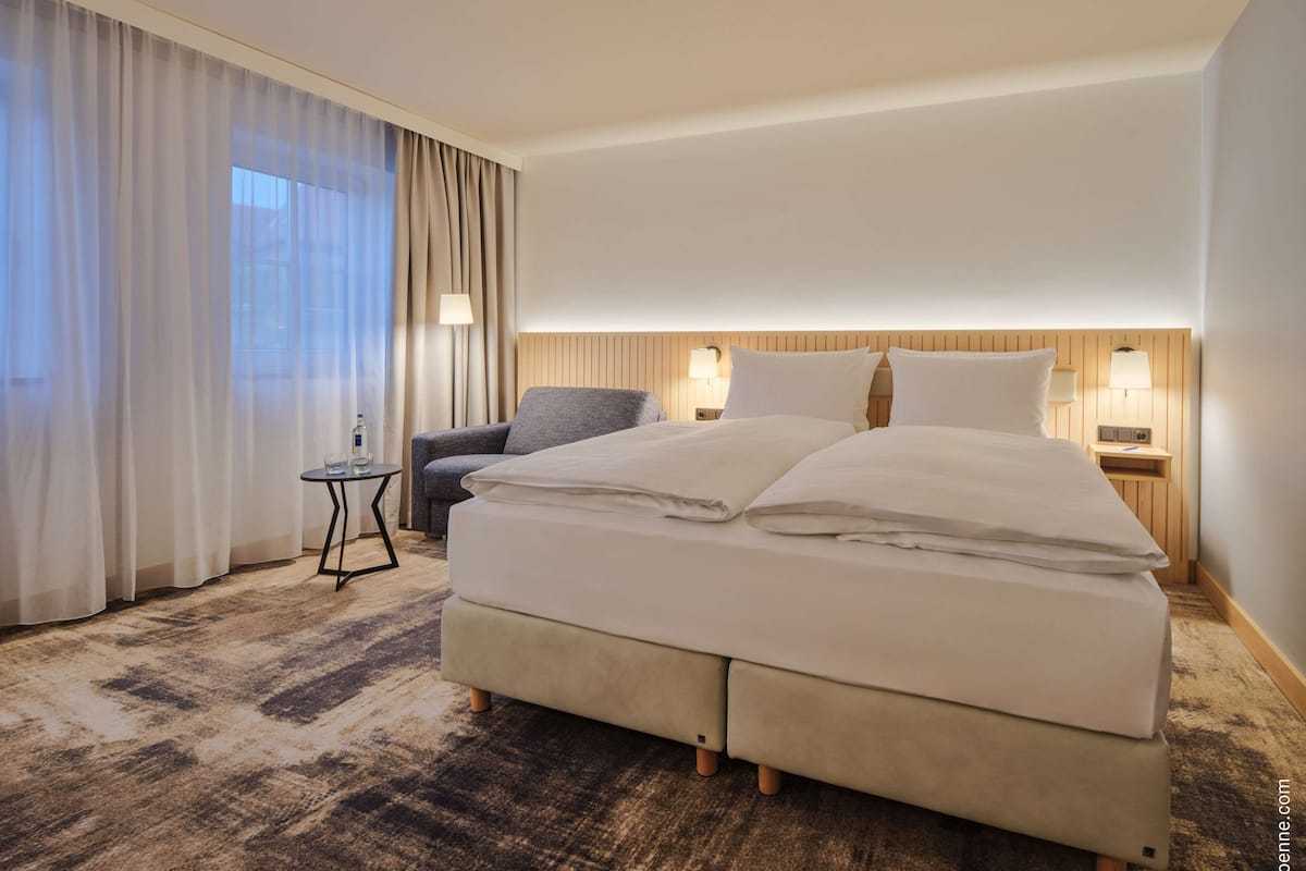 superior double room | in-room safe, desk, laptop workspace, blackout curtains