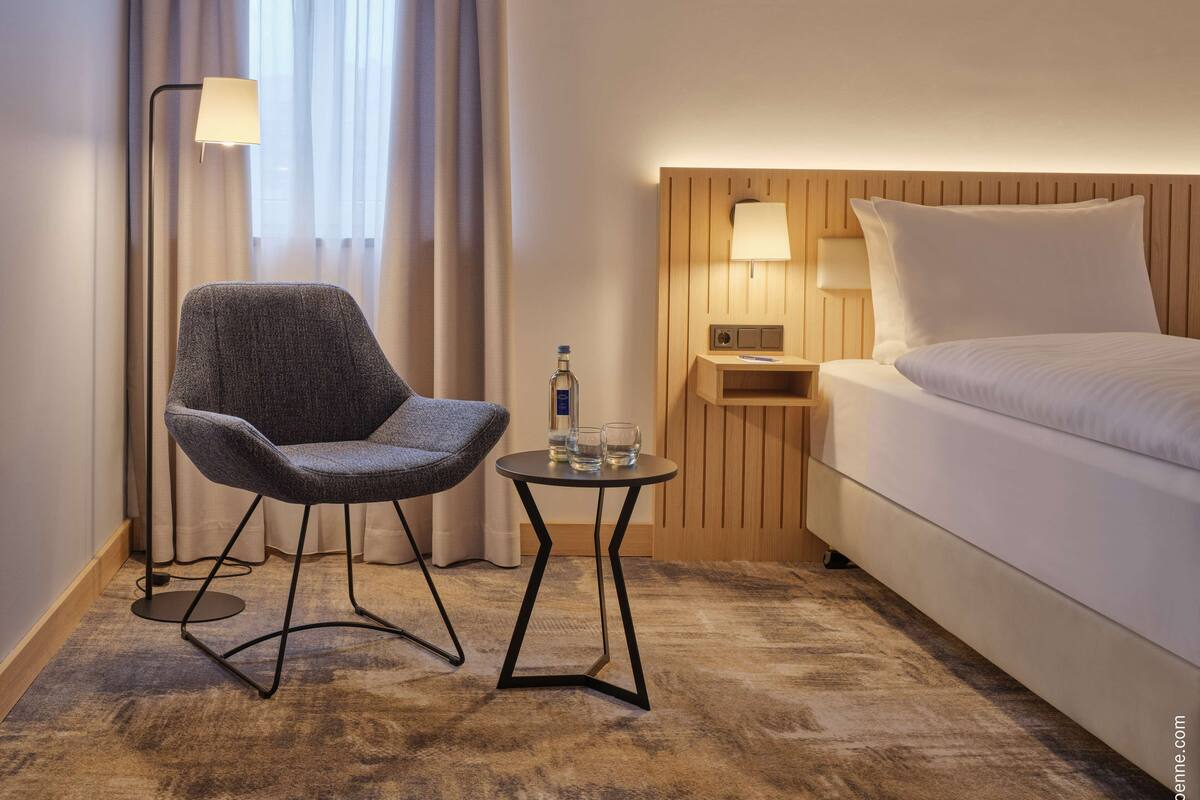 deluxe twin room | in-room safe, desk, laptop workspace, blackout curtains