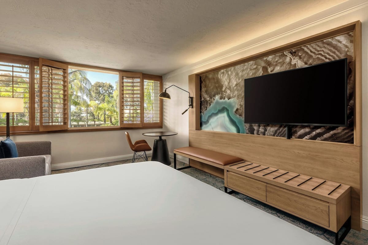 Down duvets, pillow-top beds, in-room safe, desk