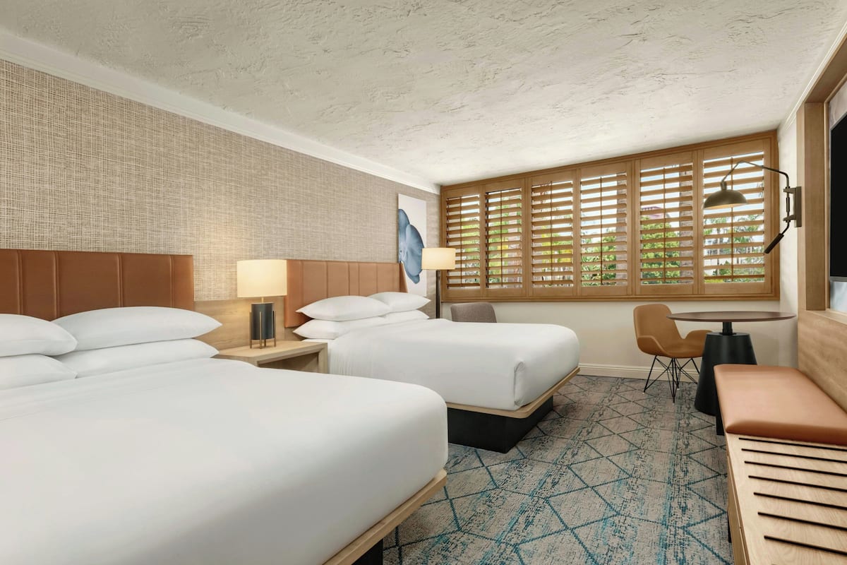 Down comforters, pillowtop beds, in-room safe, desk