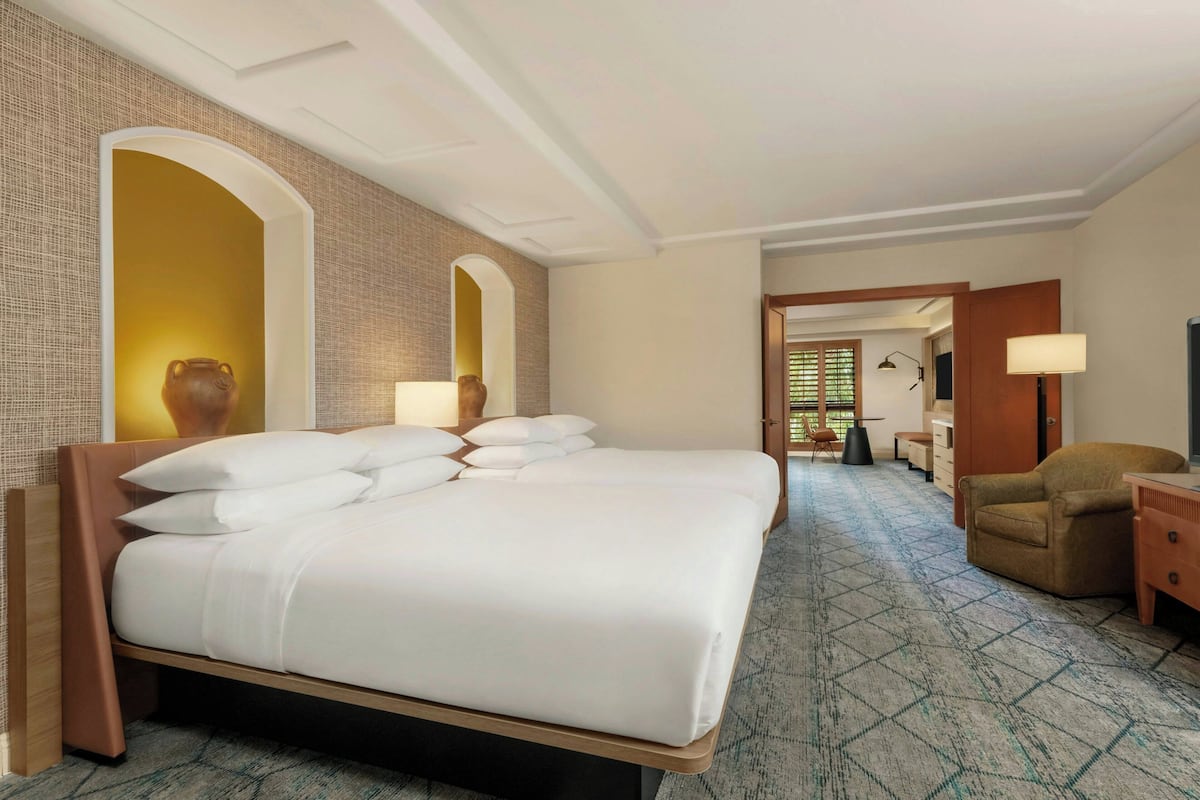 Down duvets, pillow-top beds, in-room safe, desk