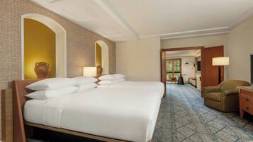 Down comforters, pillowtop beds, in-room safe, desk