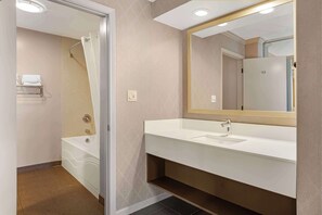 Suite, 1 King Bed, Non Smoking, Jetted Tub | Bathroom | Combined shower/tub, free toiletries, hair dryer, towels