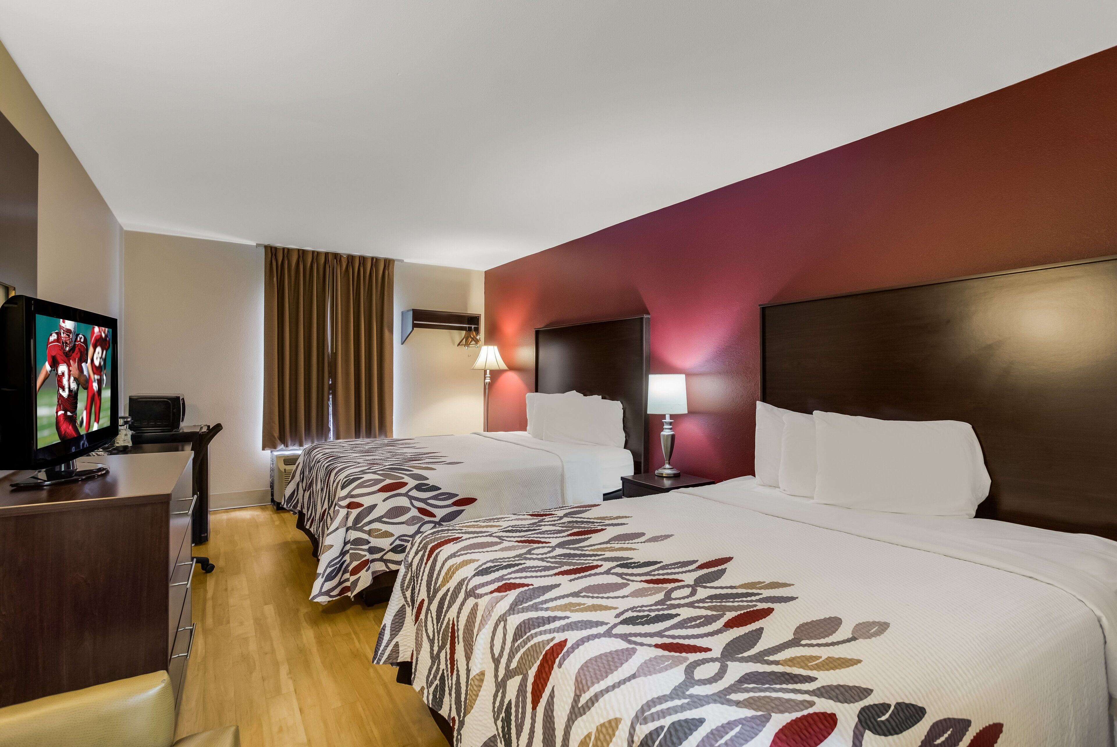 Deluxe Room, 2 Queen Beds, Non Smoking | Desk, laptop workspace, blackout drapes, free cribs/infant beds