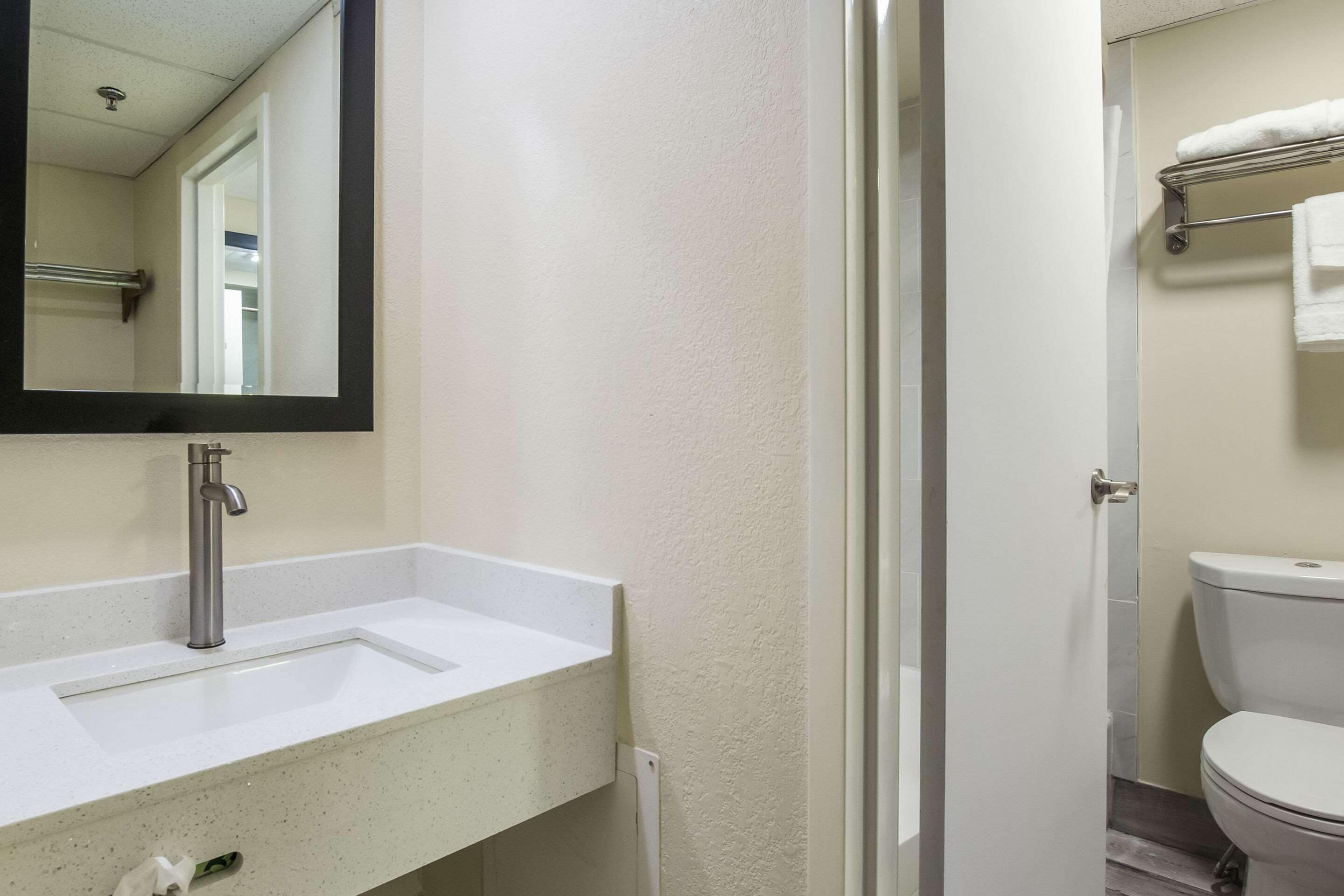 desk, blackout curtains, iron/ironing board