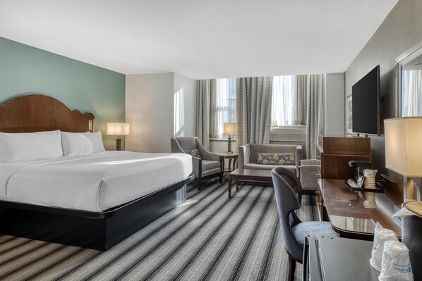 Deluxe Suite, 1 King Bed, Non Smoking, Refrigerator (with Sofabed) | Pillow-top beds, in-room safe, desk, laptop workspace