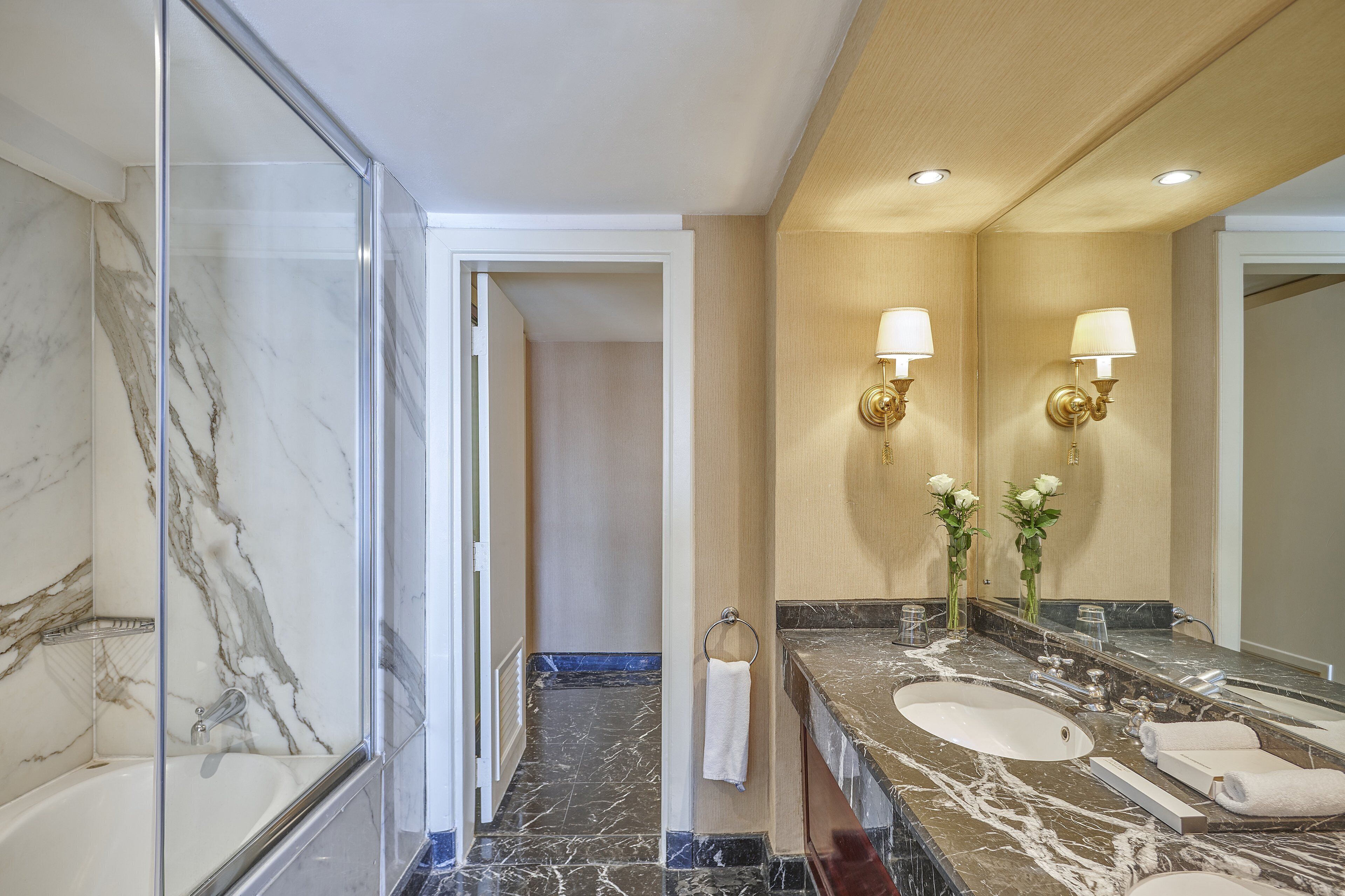 presidential suite (nile view) | bathroom | bathtub, designer toiletries, hair dryer, bathrobes