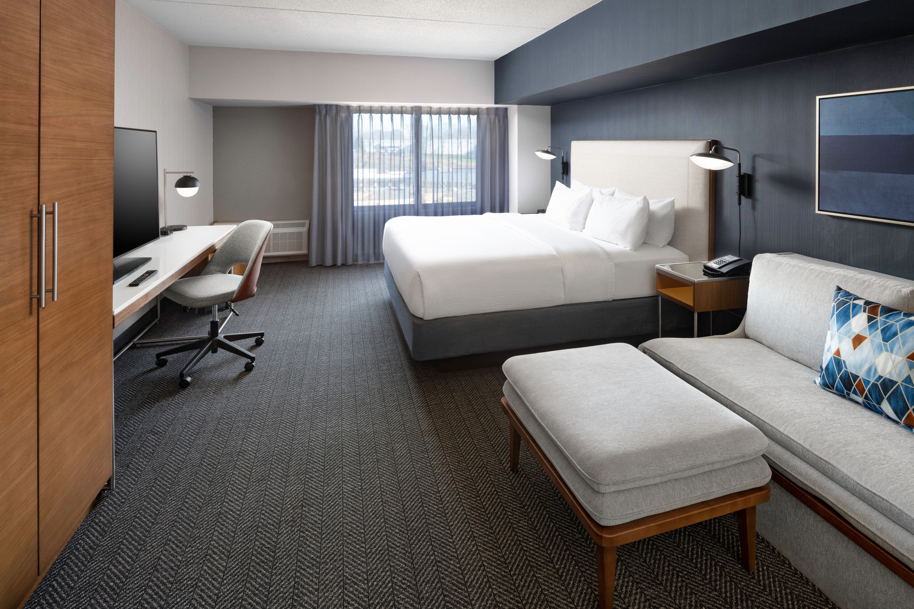 room, 1 king bed with sofa bed (mobility accessible, tub) | premium bedding, desk, laptop workspace, iron/ironing board