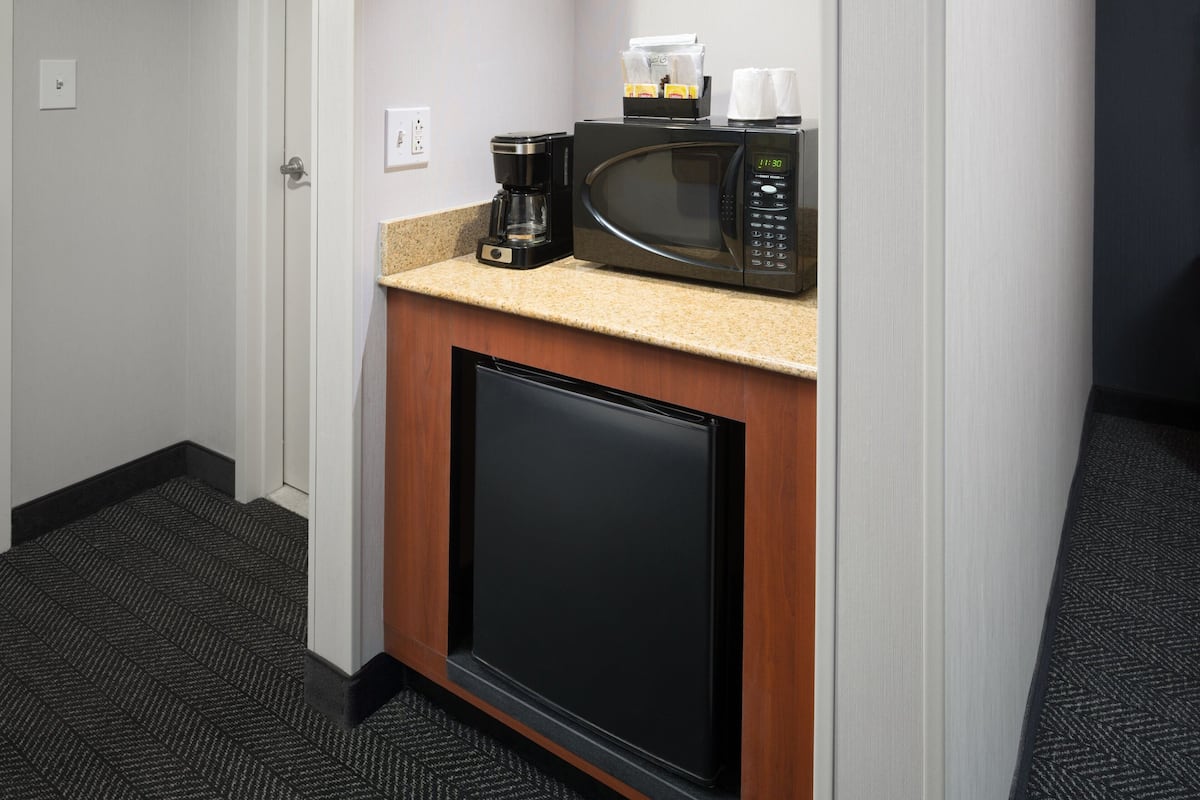 premium bedding, desk, laptop workspace, iron/ironing board