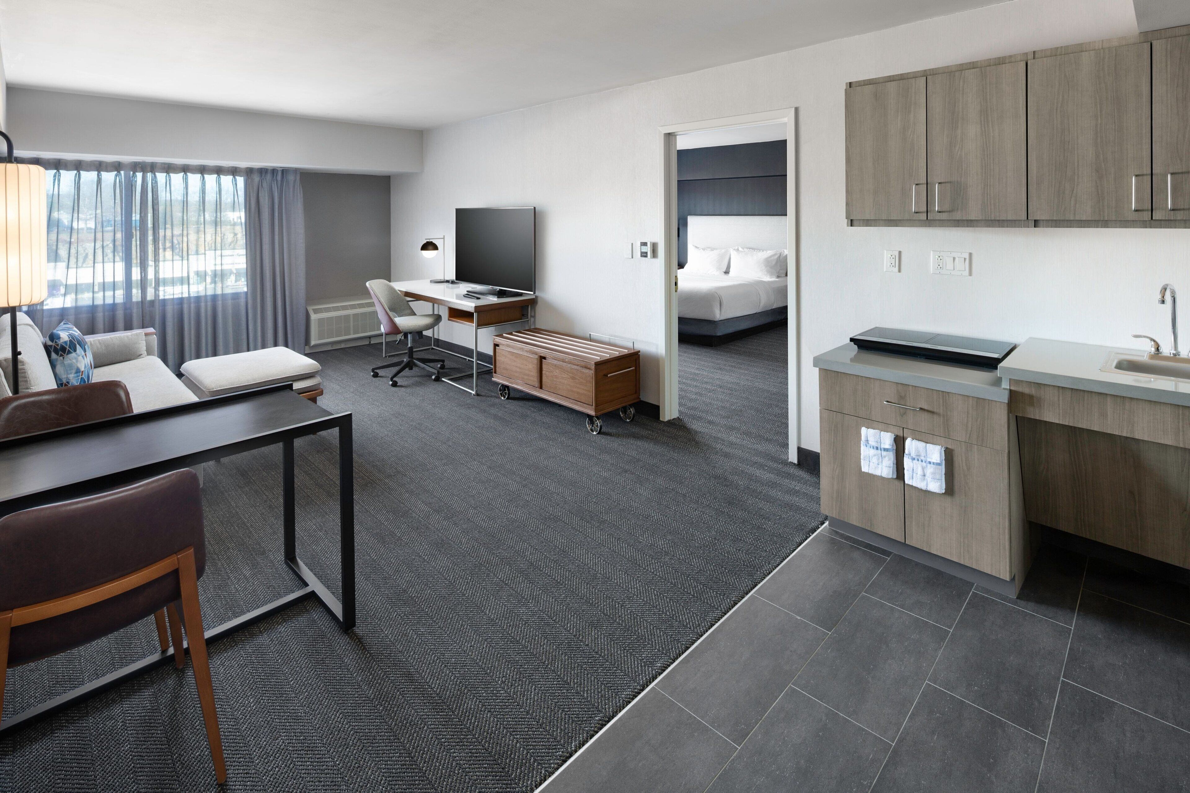 premium bedding, desk, laptop workspace, iron/ironing board