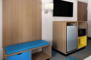 Premium bedding, desk, laptop workspace, iron/ironing board