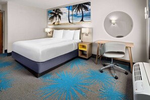 Premium bedding, desk, laptop workspace, iron/ironing board