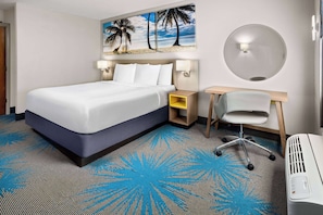 Premium bedding, desk, laptop workspace, iron/ironing board