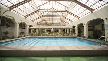 Indoor pool, open 8:00 AM to 10 PM, pool loungers