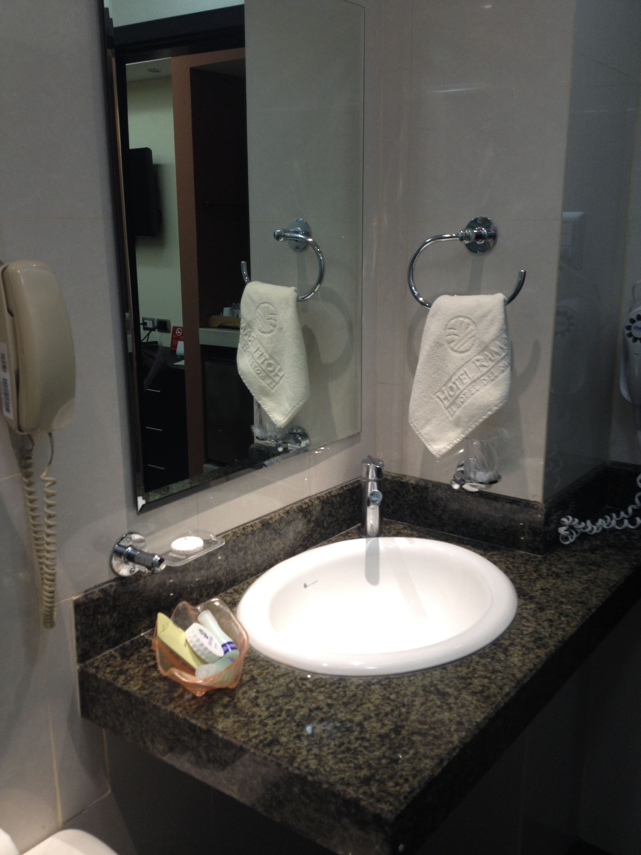 rainfall showerhead, hair dryer, towels