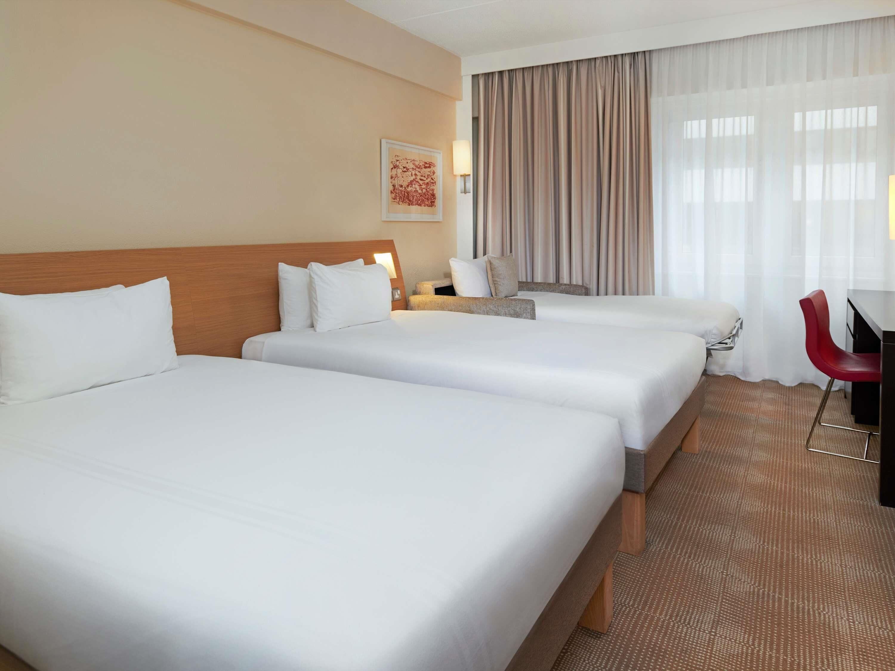 Superior Room, Multiple Beds | In-room safe, desk, laptop workspace, blackout drapes