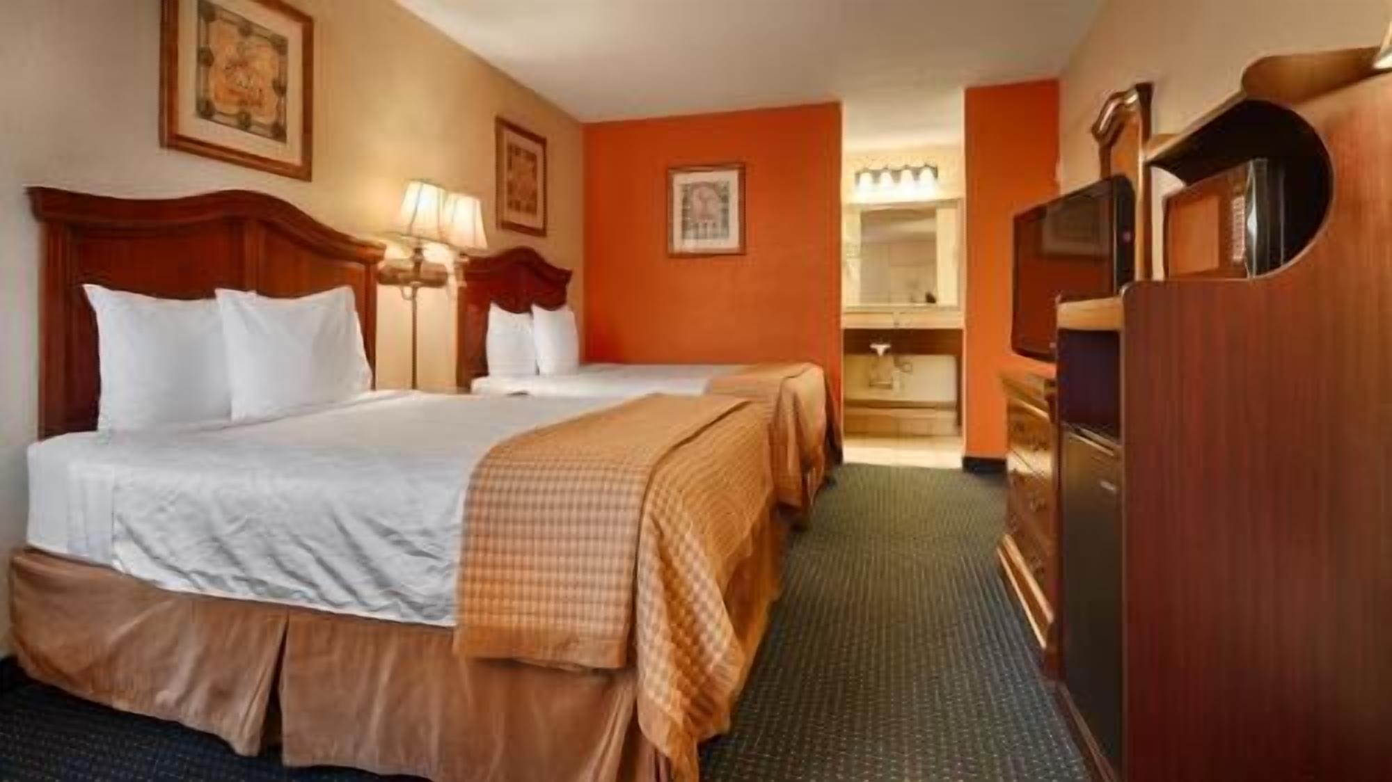 Premium bedding, desk, blackout drapes, iron/ironing board
