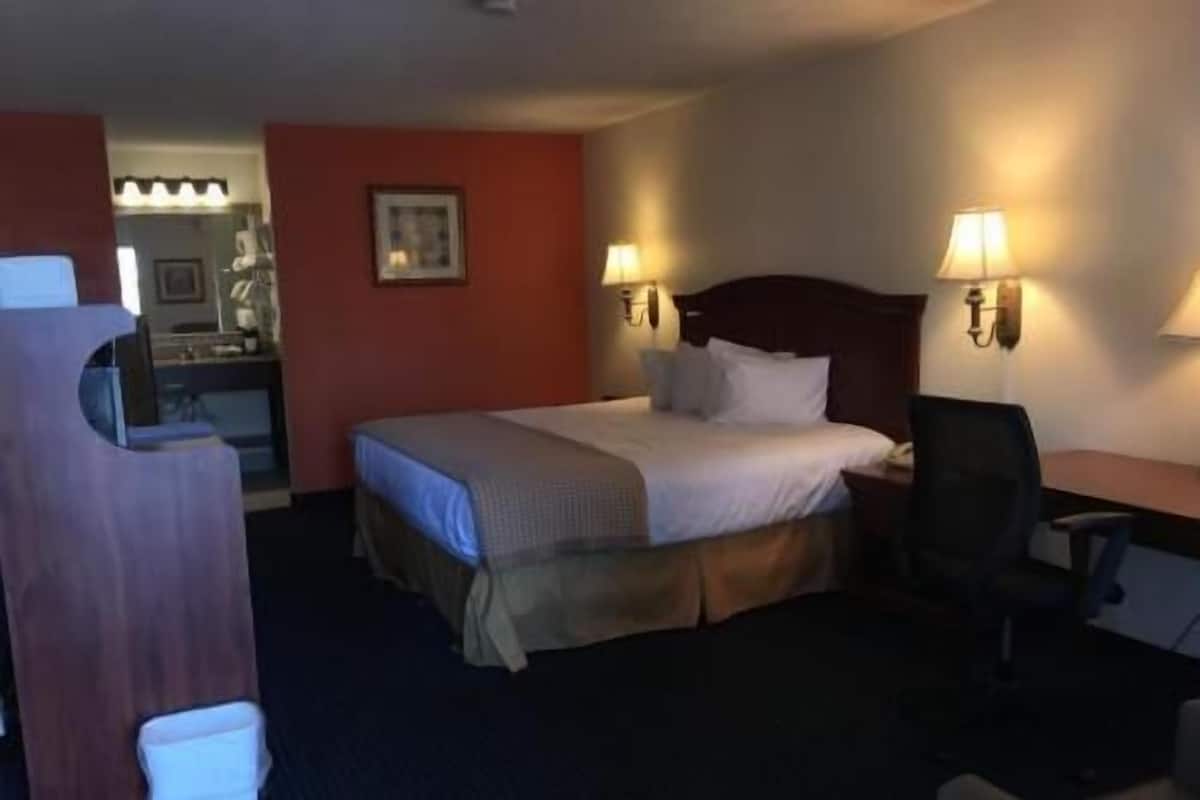 Premium bedding, desk, blackout drapes, iron/ironing board