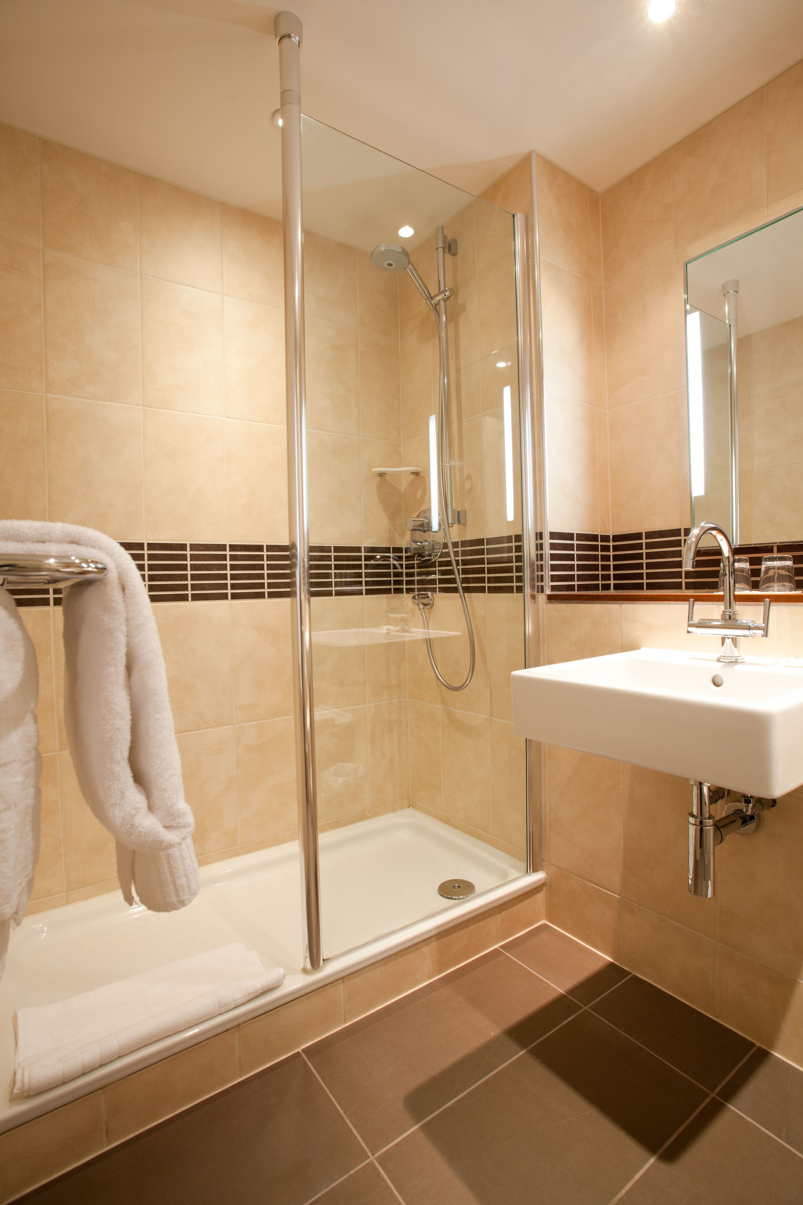 shower, eco-friendly toiletries, hair dryer, towels