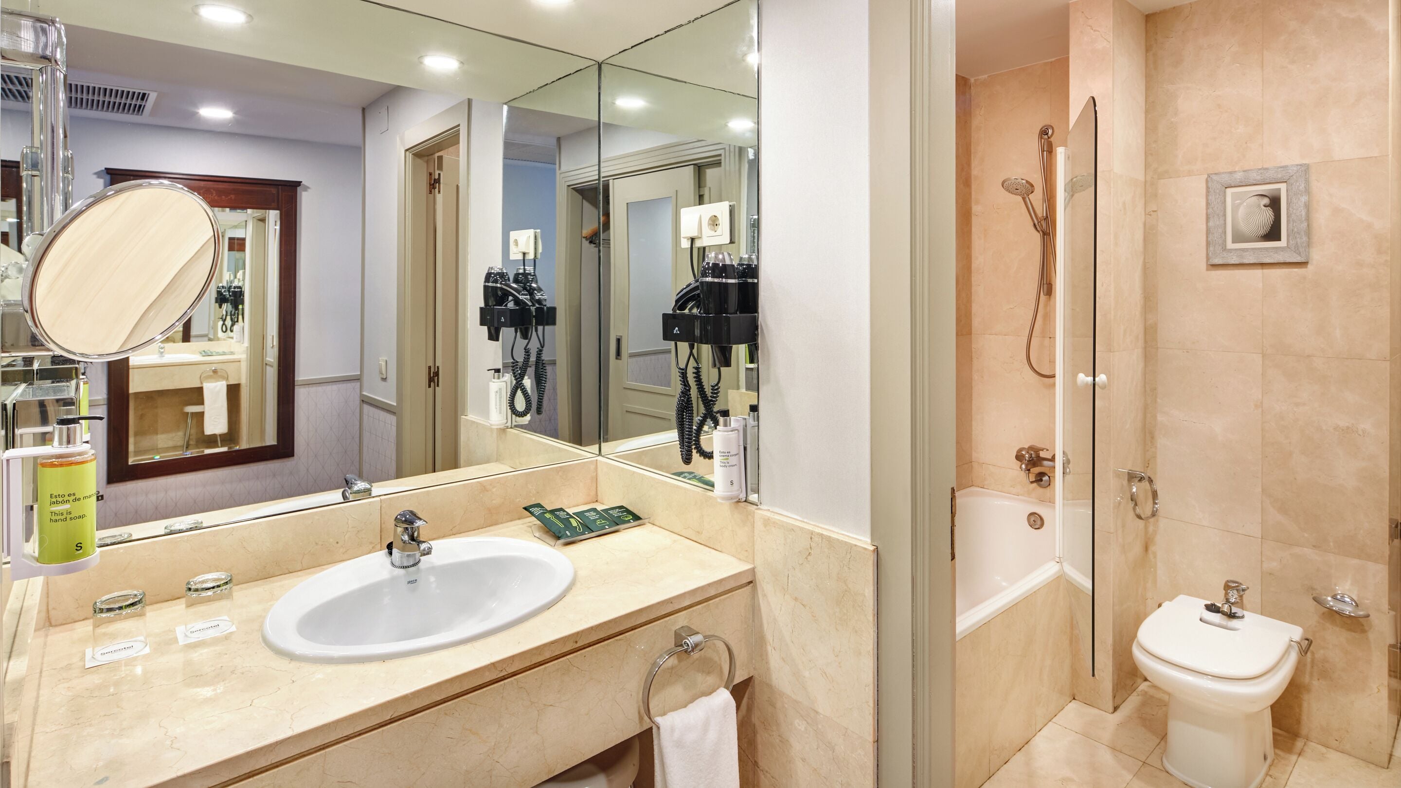 free toiletries, hair dryer, bidet, towels