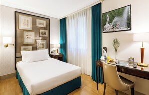 Basic Room | Premium bedding, down comforters, memory foam beds, minibar