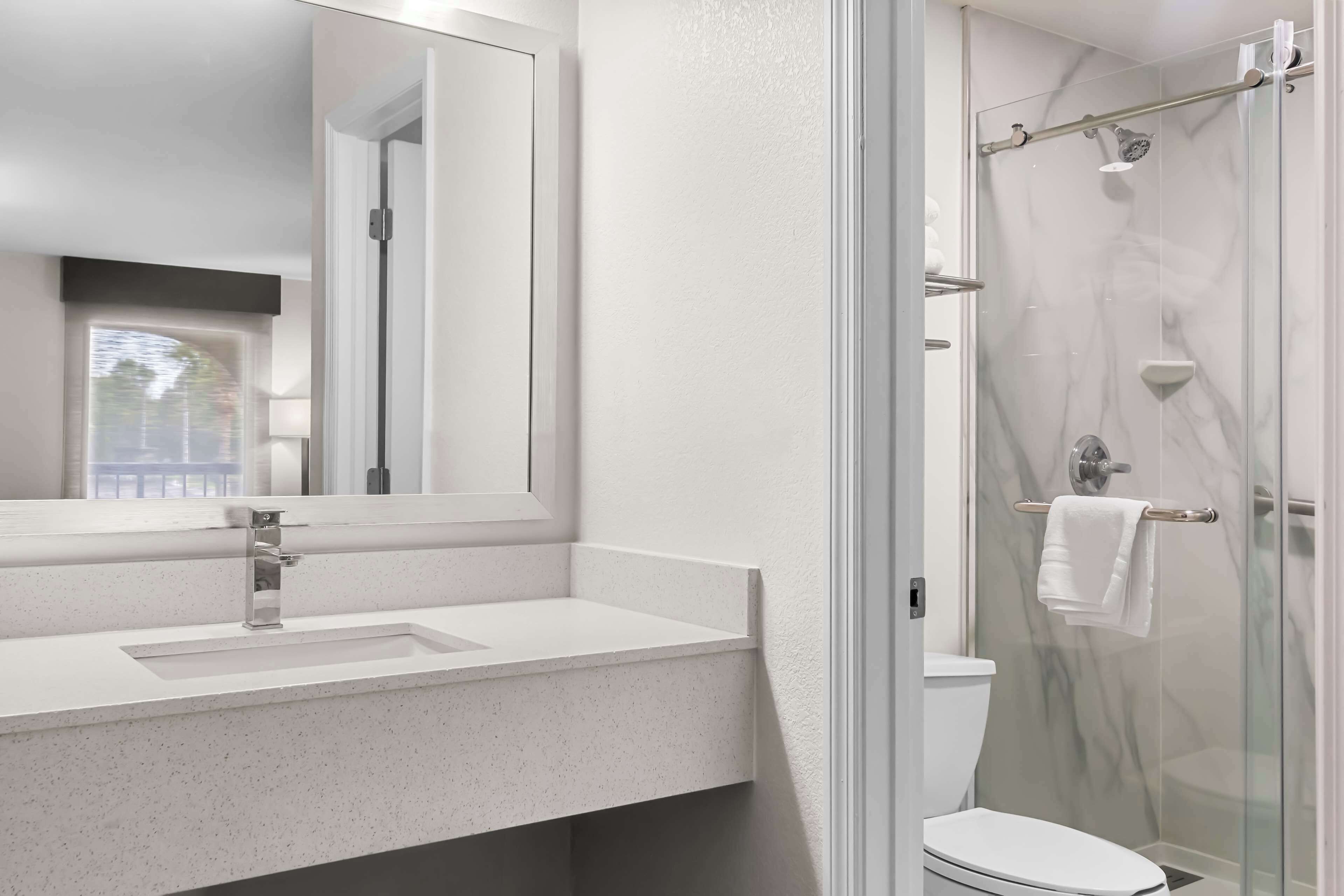 standard room, 2 queen beds, non smoking, refrigerator & microwave (shower only) | bathroom | free toiletries, hair dryer, towels, soap