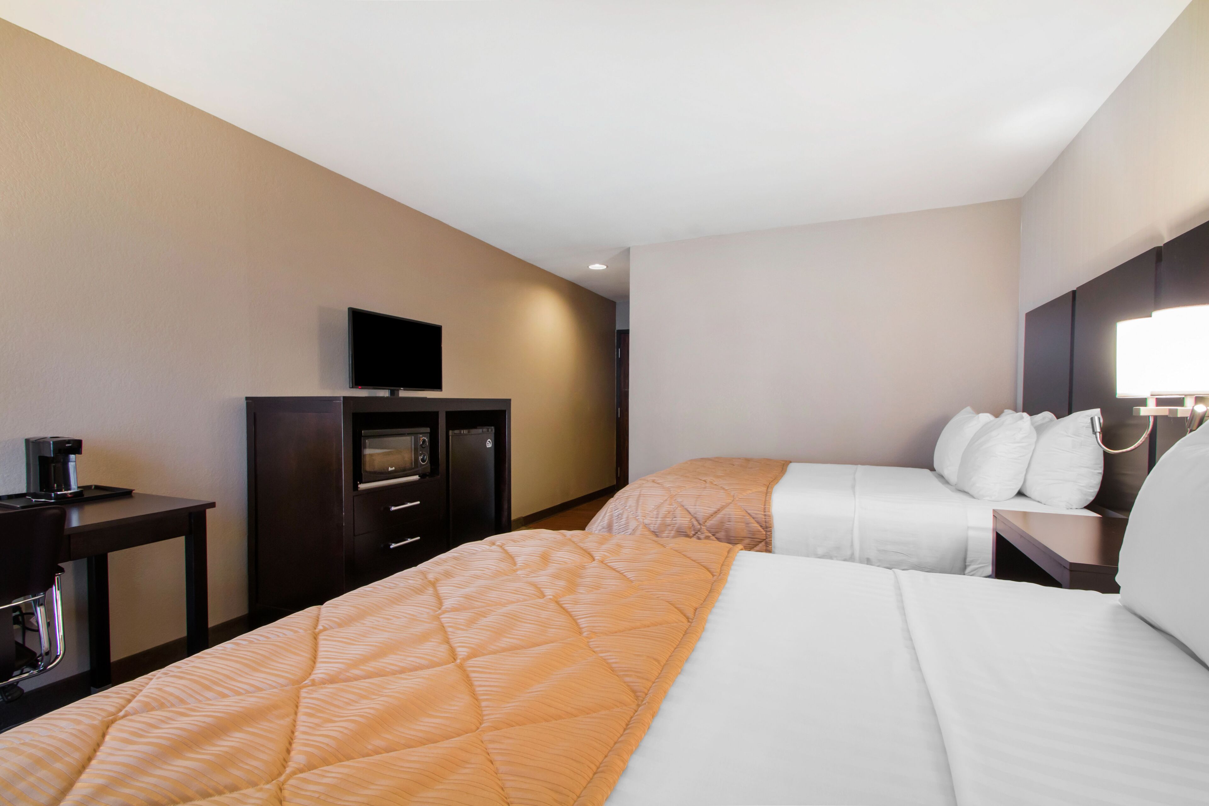 premium bedding, desk, laptop workspace, blackout curtains