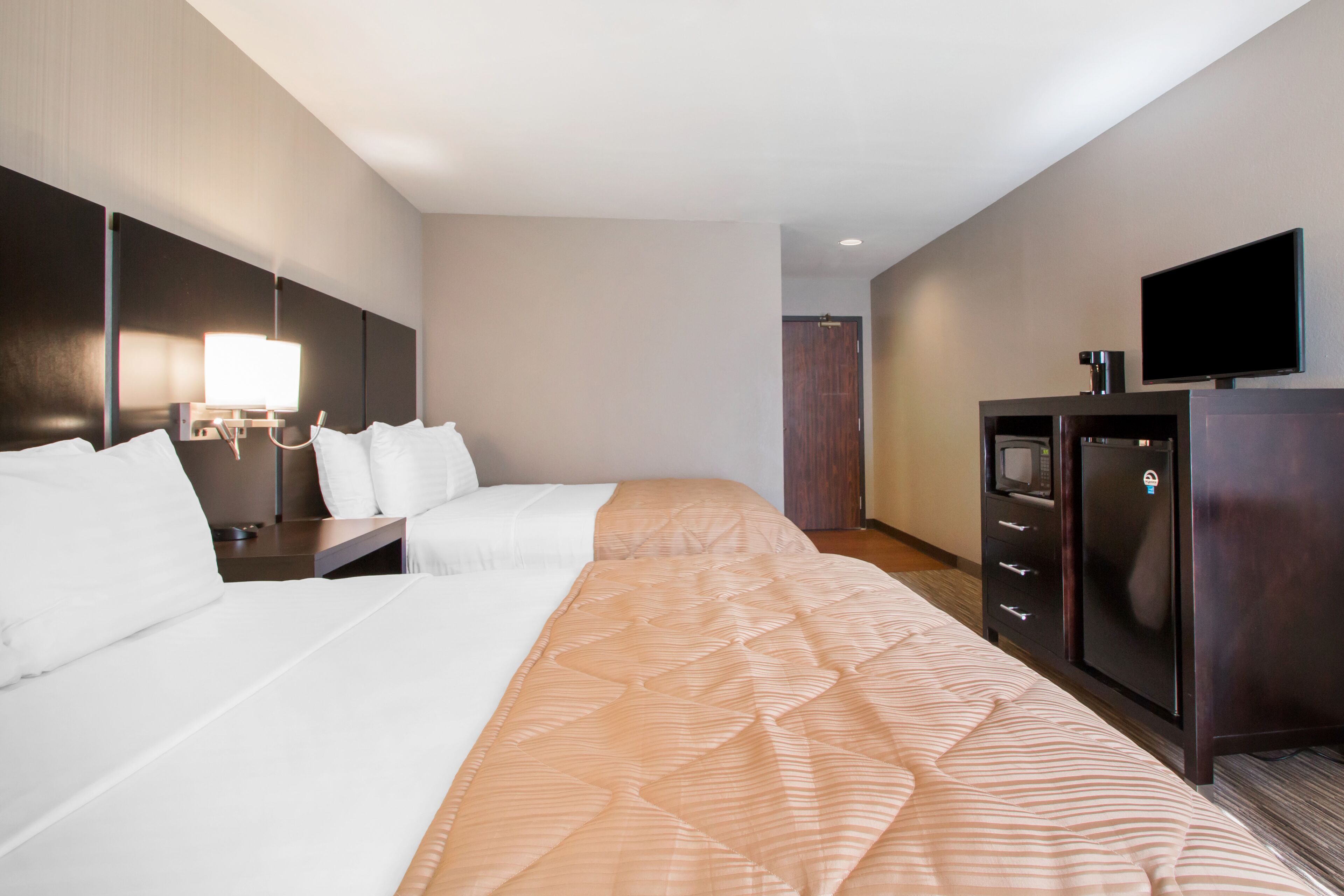 premium bedding, desk, laptop workspace, blackout curtains